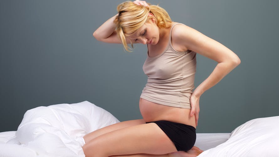 femme douloureuse pendant la grossesse