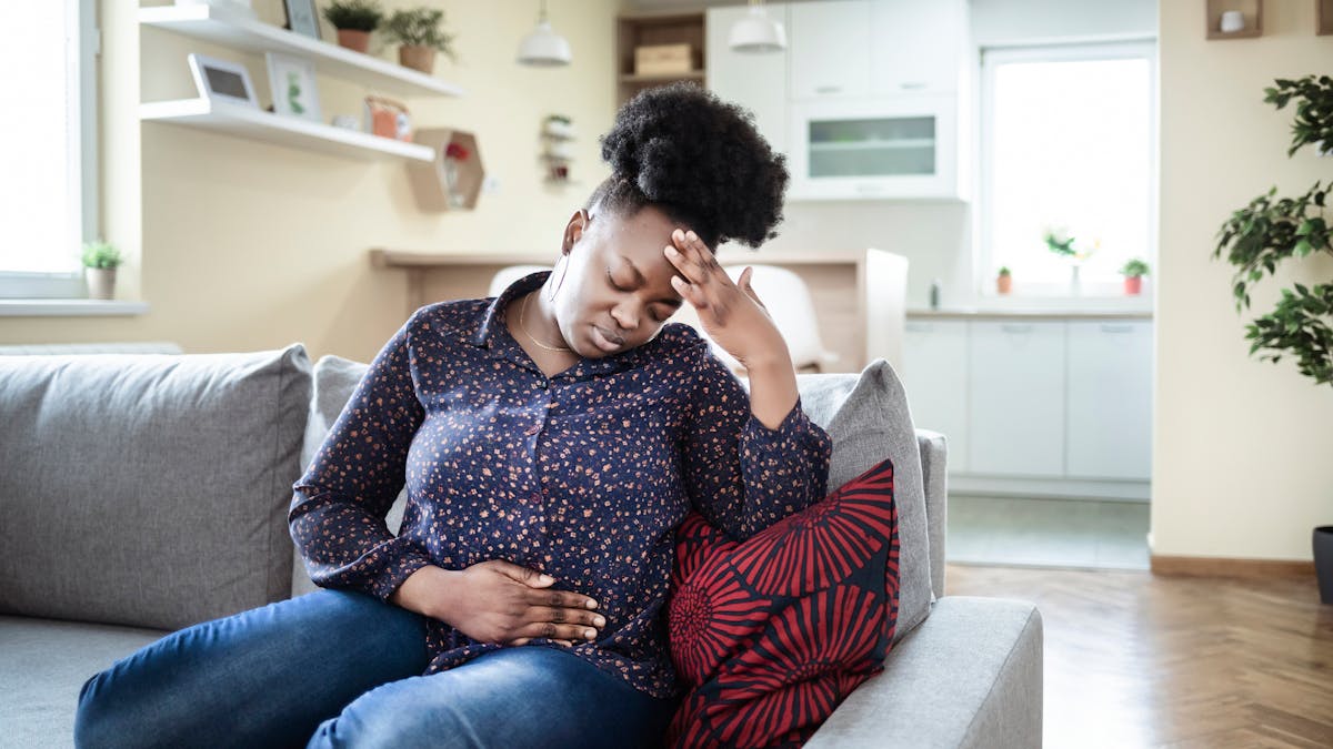 Femme souffrant d'un trouble dysphorique prémenstruel